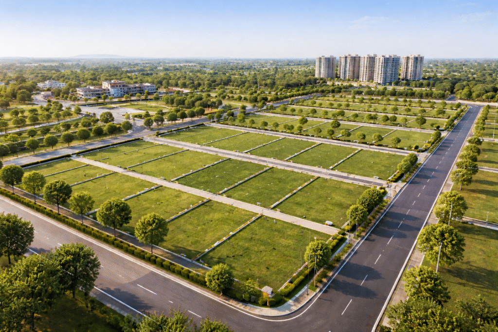 Residential Plots for Long Term Investment in Nagpur Residential plots in Nagpur with wide internal roads, marked boundaries, greenery, and planned township infrastructure
